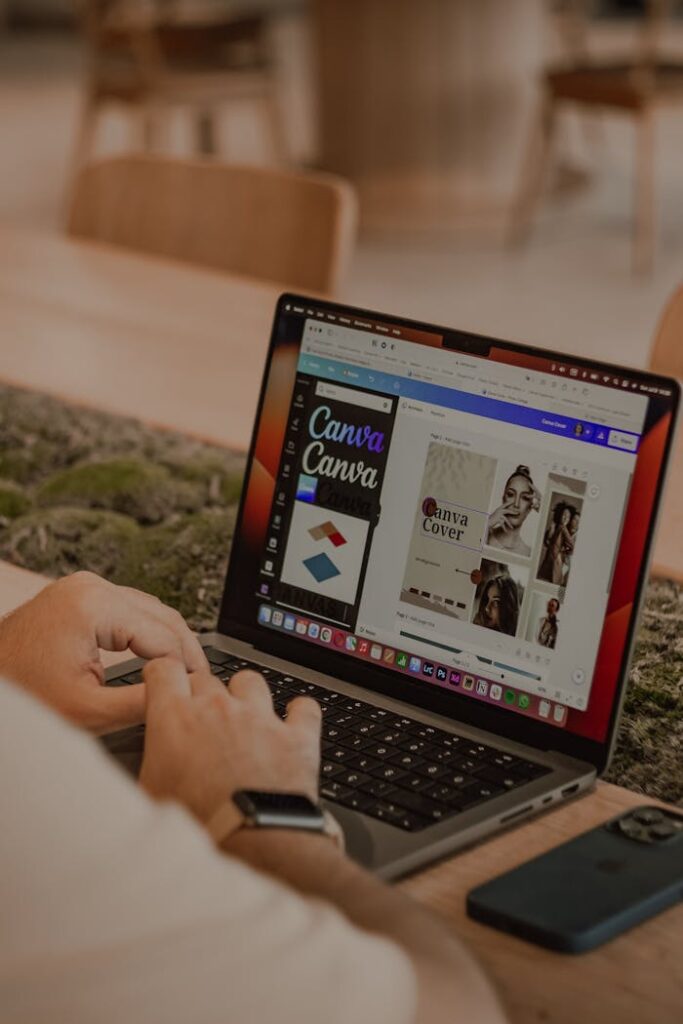 pexels photo 17615039 Close-up of a person using a laptop to design with Canva.